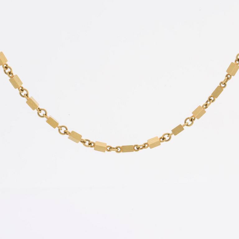 WIWEN NILSSON COLLIER 18K guld mindre stavar och ringar, Lund 1970, original etui.
