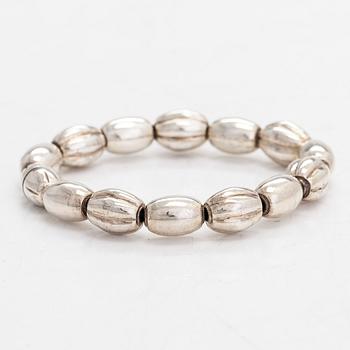 A set of silver "Halikko treasure" necklace, bracelet, ring and earrings. Kalevala Koru, Helsinki 1965-1972.