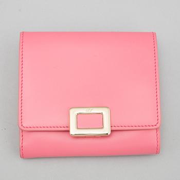 Roger Vivier, a pink leather wallet.