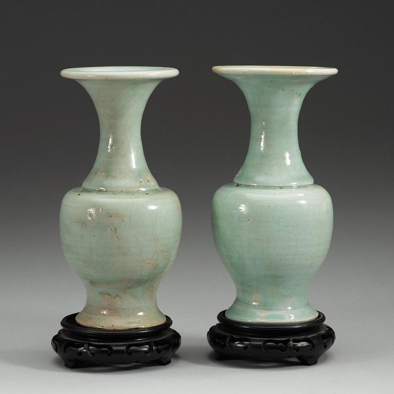 A pair of celadon glazed vases, presumably Yuan/Ming dynasty.