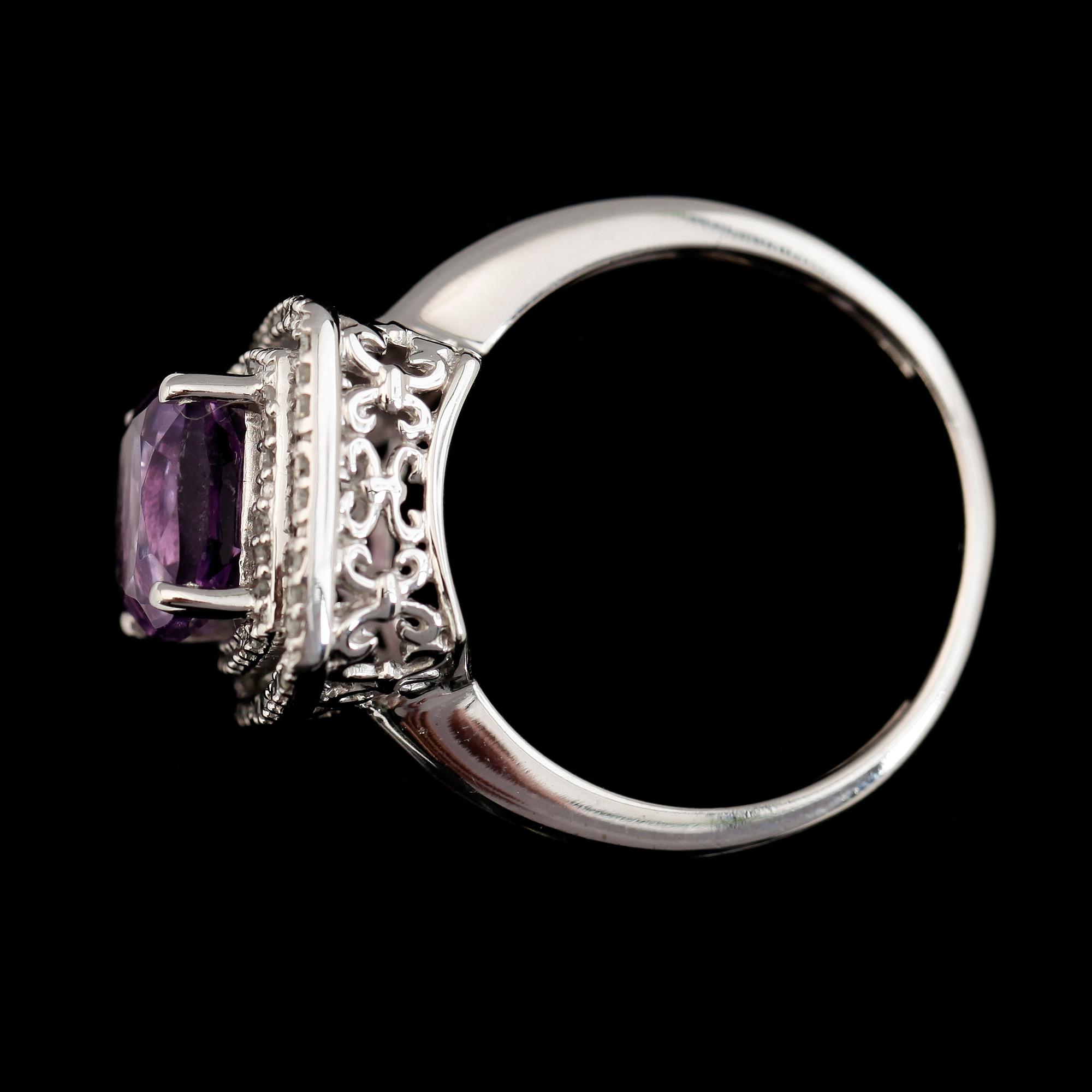 RING, 14K guld, diamanter tot ca 0.25 ct och ametister. Total vikt ca 4,5 g.