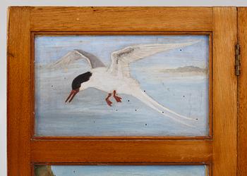 A folding screen, late 19th century.