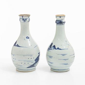 A pair of similar blue and white vases, China, Qing dynasty, 19th century.