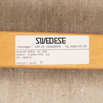 Yngve Ekström, a pair of "Lamino" armchairs for Swedese.