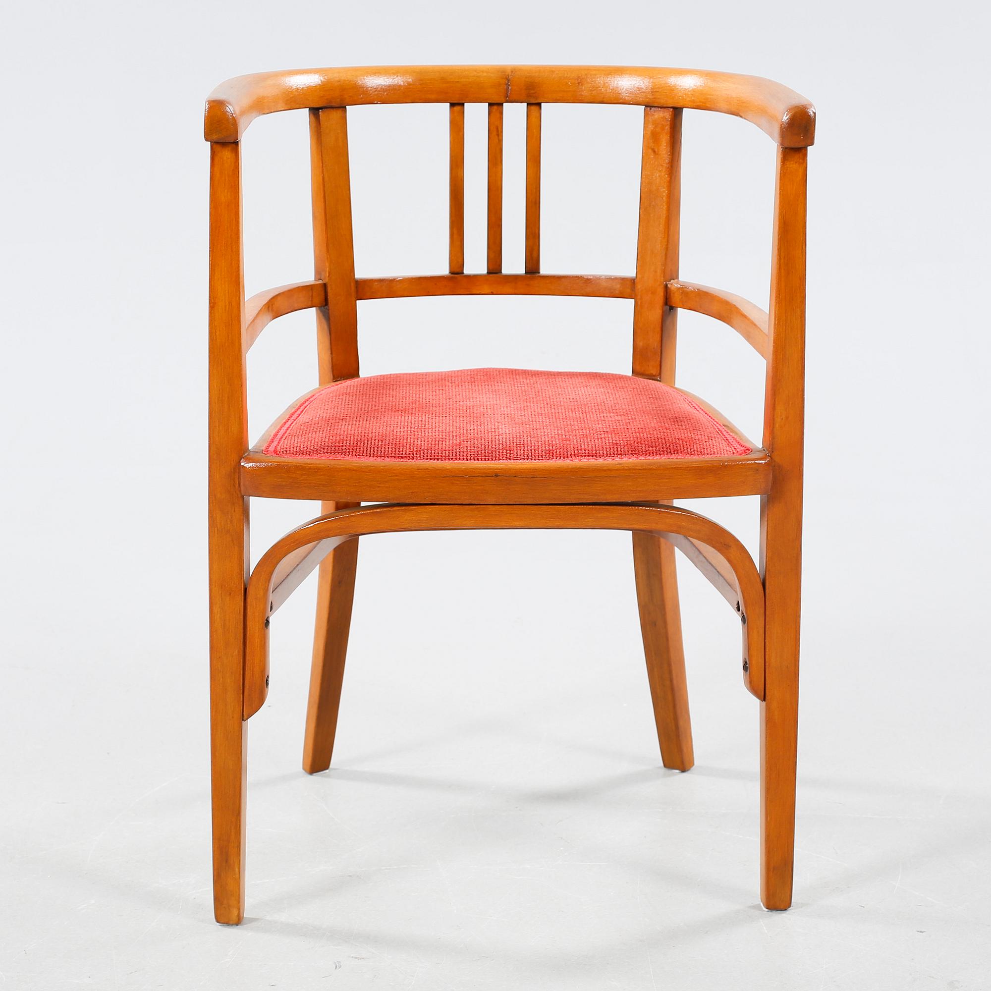 A table and a arm chair from the second quarter of the 20th century.