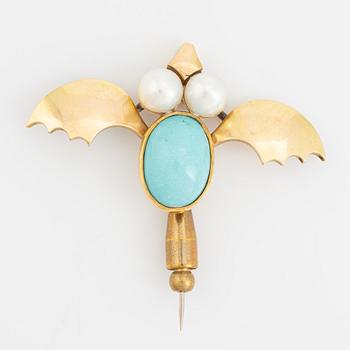 An 18K gold brooch set with a turquoise and cultured pearls.