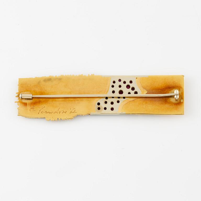Arnaldo Pomodoro, a brooch, 18K gold with rubies, Italy 1962.