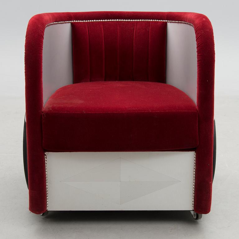 A 21st 'Ben Hur' armchair for Roche Bobois.