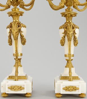 A pair of Napoleon III five-light candelabra.