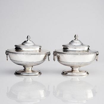 An English pair of sauce tureens with covers, mark of Andrew Fogelberg, London 1774.
