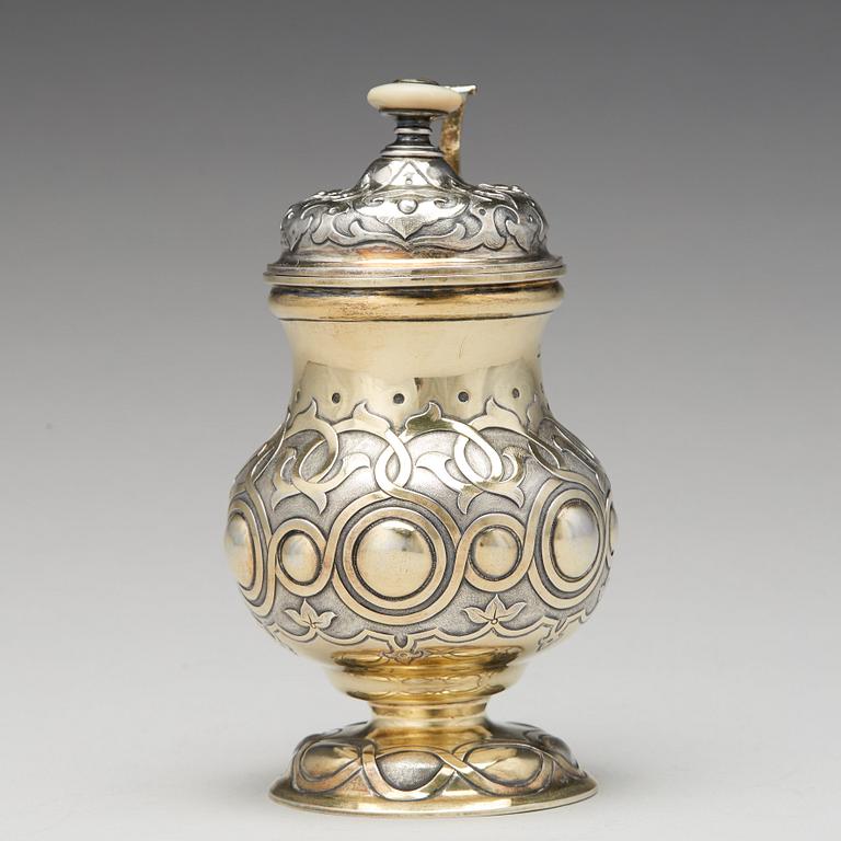 A Russian 19th century parcel-gilt silver tankard, unidentified makers mark, St. Petersburg 1864.