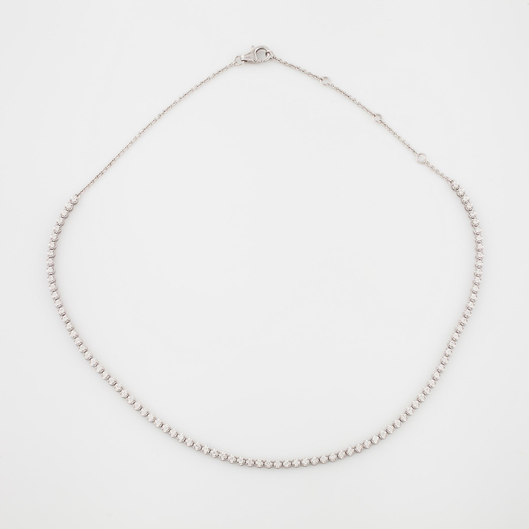 COLLIER, med briljantslipade diamanter, totalt ca 1.40 ct.