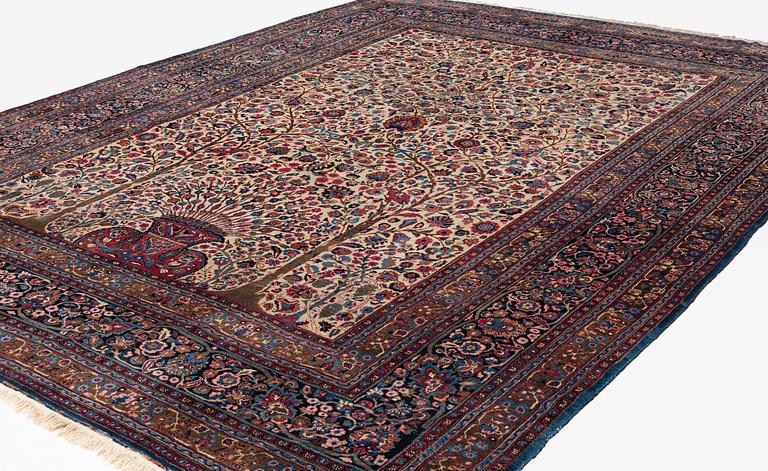 A carpet, semi-antique, Mashad/Moud, ca 431 x 324 cm.