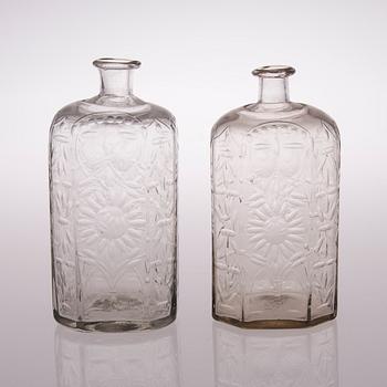 Two 18th century Baroque glass bottles.