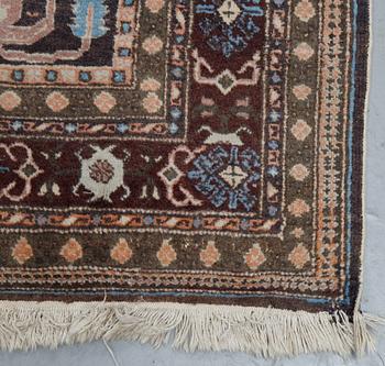 A carpet, semi-antique/Old Ardabil, ca 264 x 272 cm.