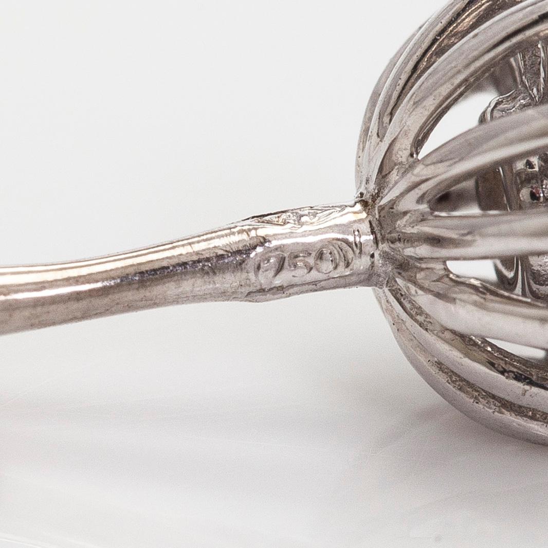 Örhängen, briljant- och åttkantslipade diamanter, 18K vitguld.