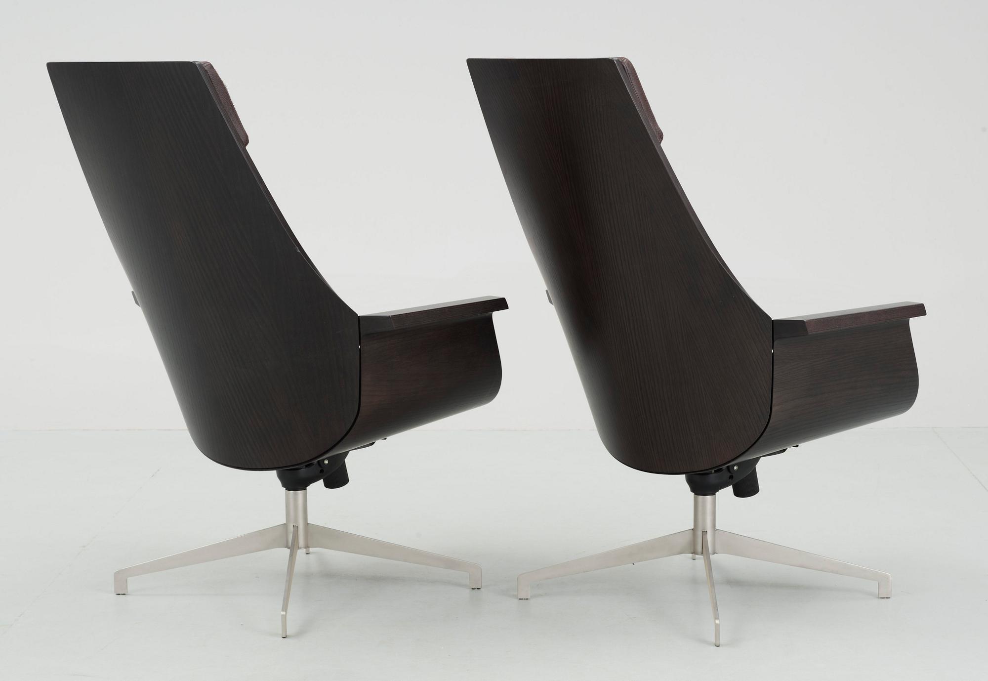 A pair of Jorge Pensi 'Bkai' brown lether and aluminium armchairs,