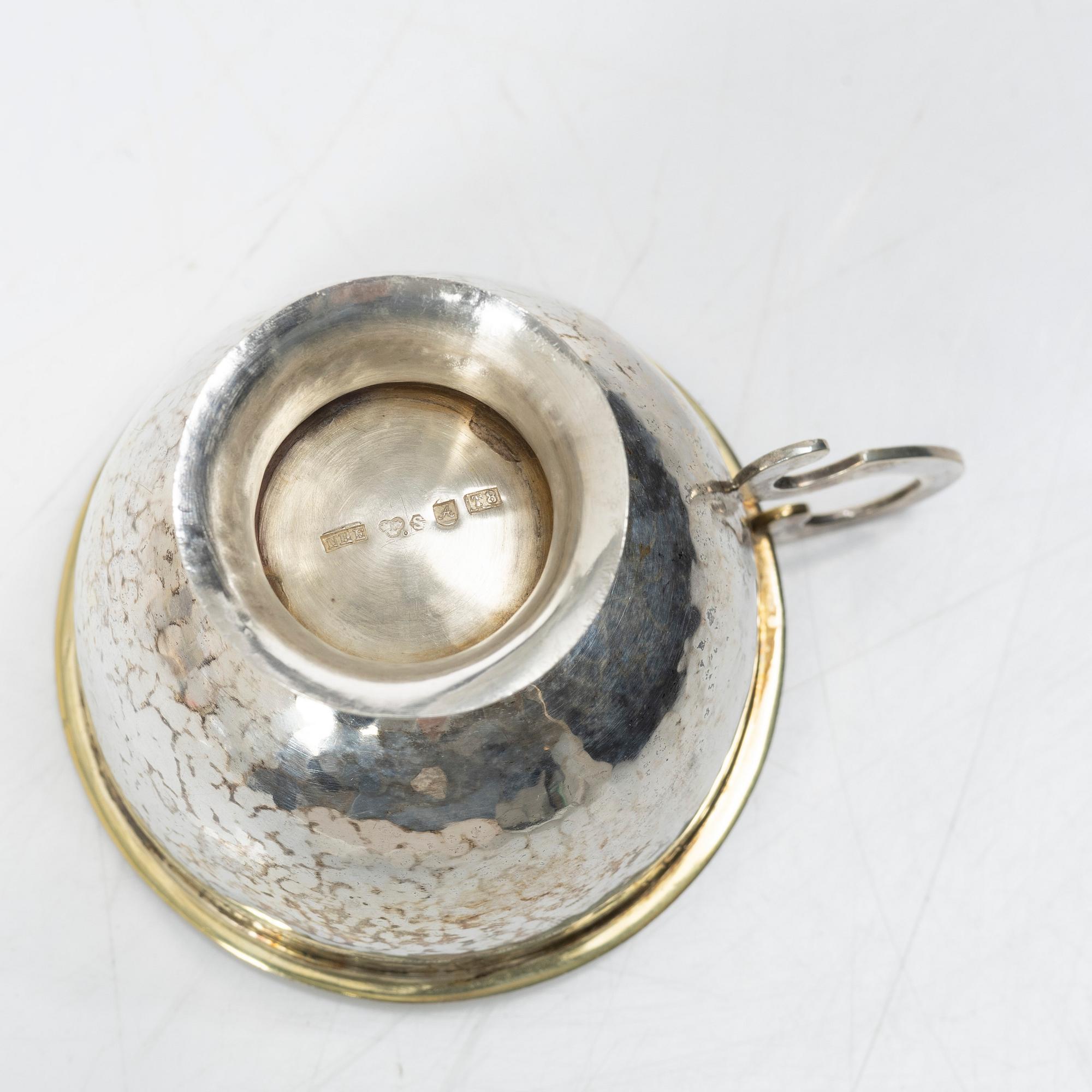 A set of eleven silver punch mugs, including with mark of Nya Guldsmedsaffären Göte Persson, Vilhelmina 1951.