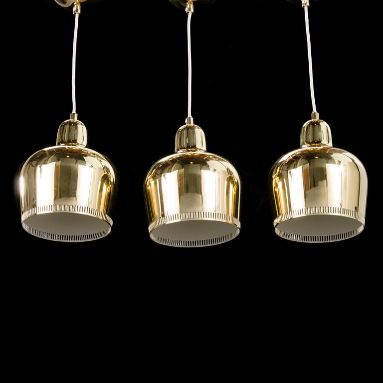 ALVAR AALTO, A set of three 'Golden Bell'pendant ceiling lights A33S, Artek, early 2000s.