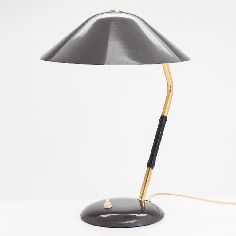 A mid 20th- century tamble lamp for Valinte.