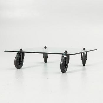Gae Aulenti, Coffee table, “Tavolo con Ruote”, Fontana Arte, Italy, late 20th/early 21st century.