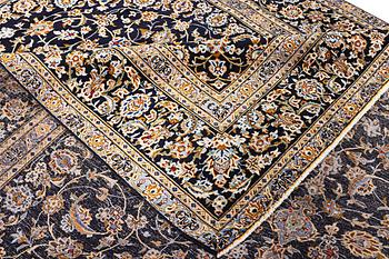 A Kashan carpet, c. 413 x 308 cm.