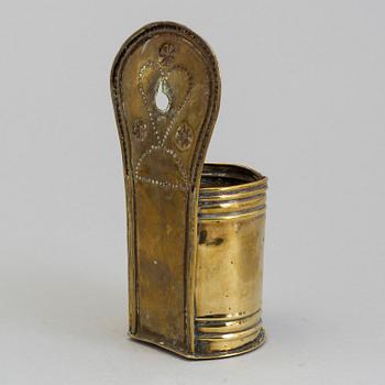 A 19TH CENTURY BRASS SPOON HOLDER.