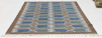 A flat weave carpet from Klockaregårdens Hemslöjd, Sweden, siged KH & NH, ca. 242 x 169 cm.