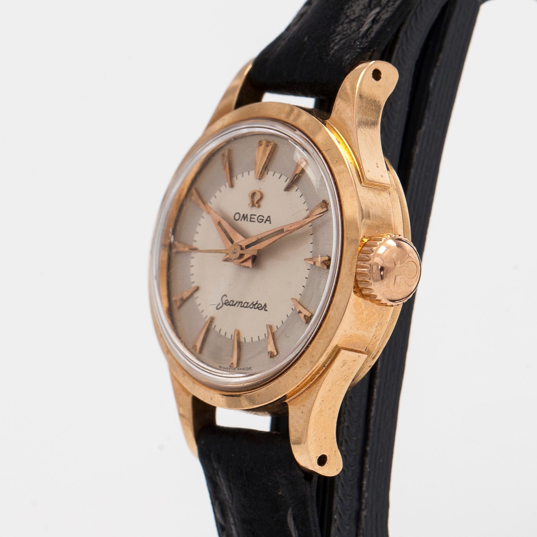 Omega, Seamaster, wristwatch, 22 mm, 18K gold, manual, plastic crystal.