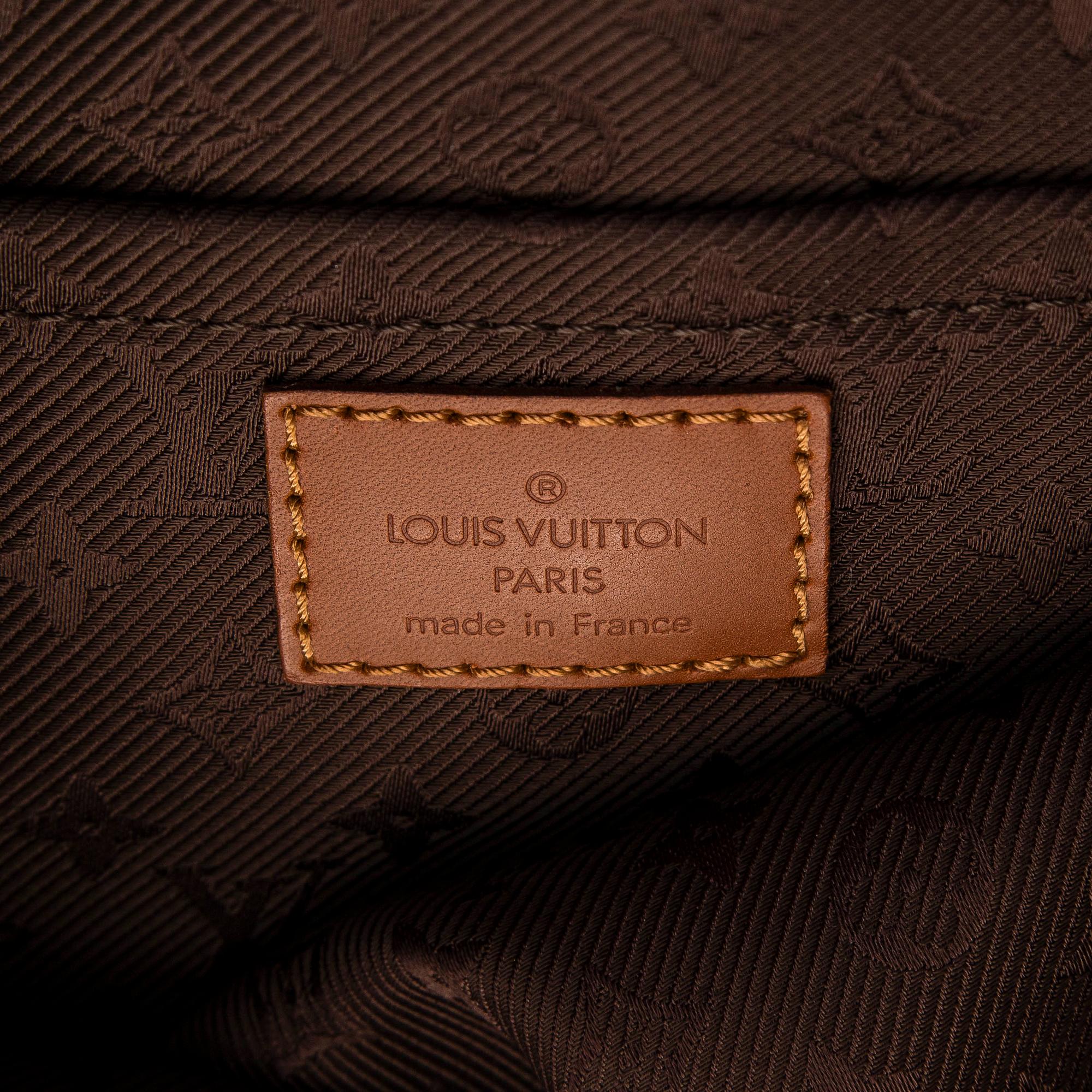 Louis Vuitton, an "Onatah GM" suede bag.