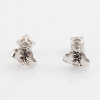 Brilliant cut diamond stud earrings, total ca 0,49 ct.
