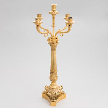 A latter half of the 19th-century candelabrum/ table light, altered in the 20th century.
