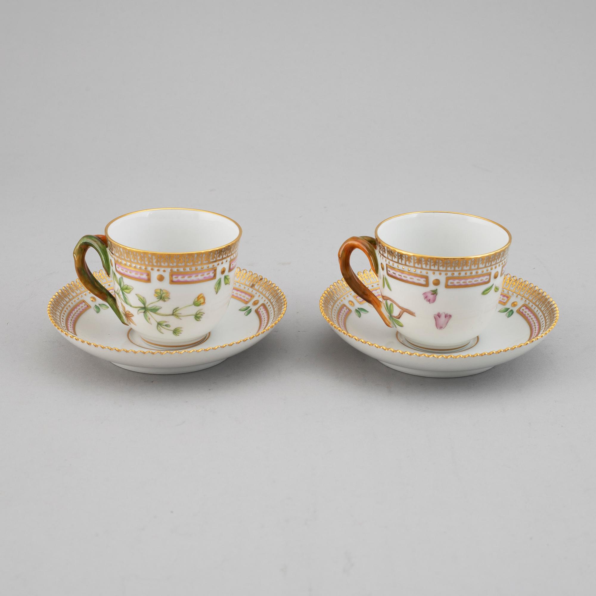 A pair of Royal Copenhagen 'Flora Danica' coffee cups with saucers, Denmark.