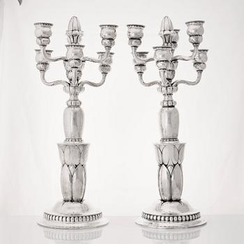 Georg Jensen, a pair of six lights silver candelabra, Copenhagen 1920, design nr 38.