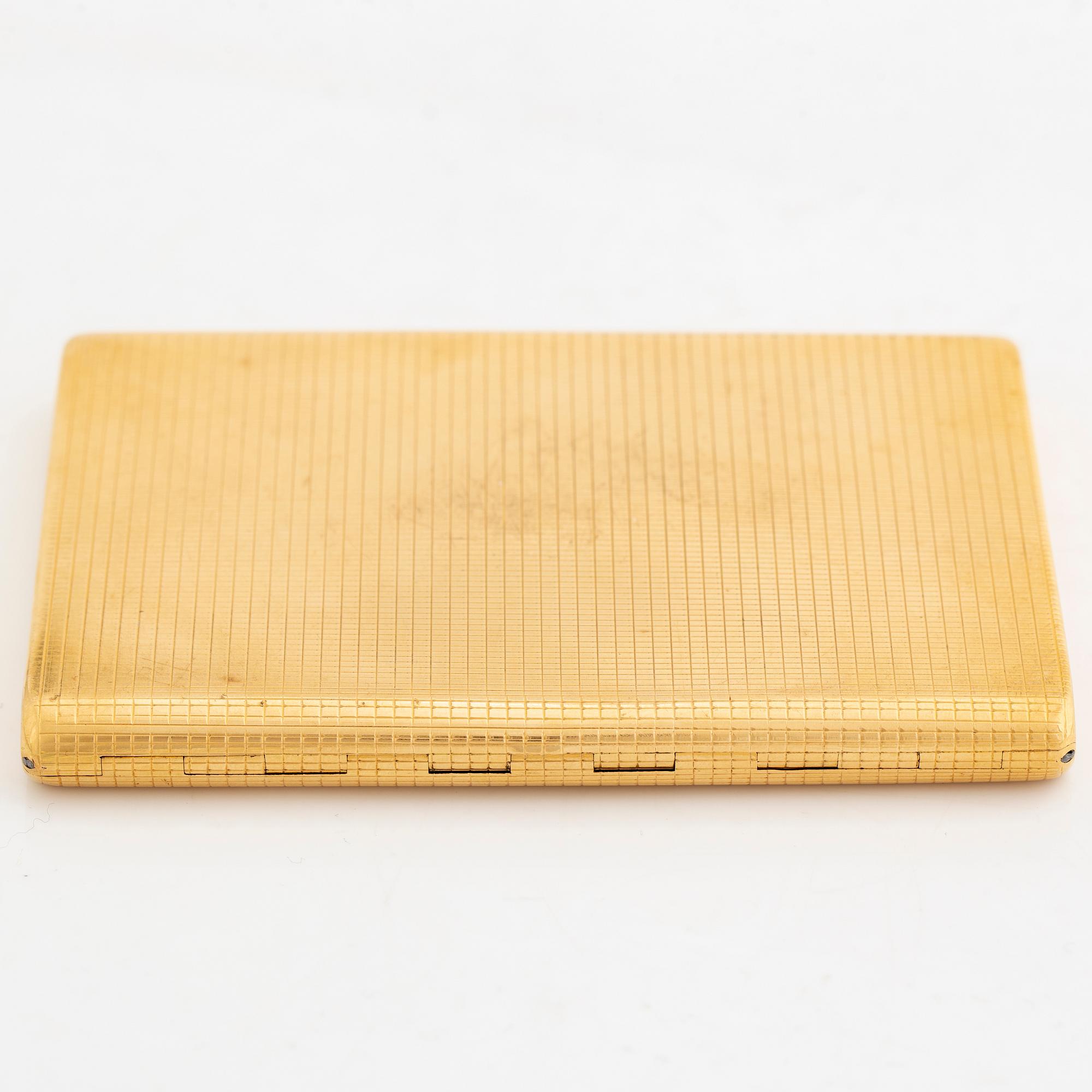 18K gold cigarette case.