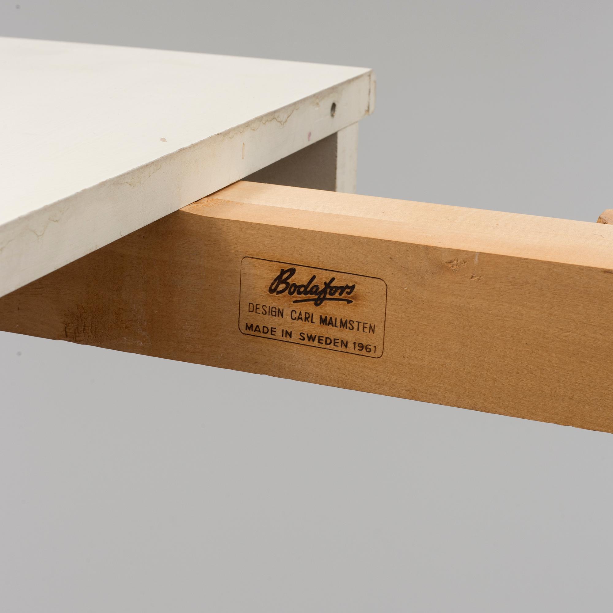 A 'Herrgården' table by Carl Malmsten, Bodafors, 1961.
