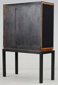 An Otto Schulz stained birch and mahogany cabinet, by Boet, Sweden 1930's.