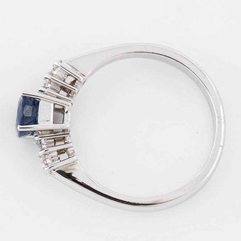 A sapphire and brilliant cut diamond ring.