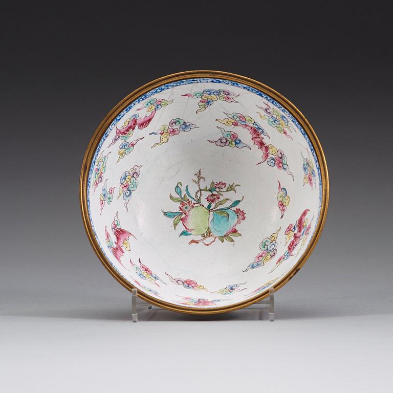 An enamel on copper bowl with figures in a garden, Qing dynasty, Qianlong (1736-95).
