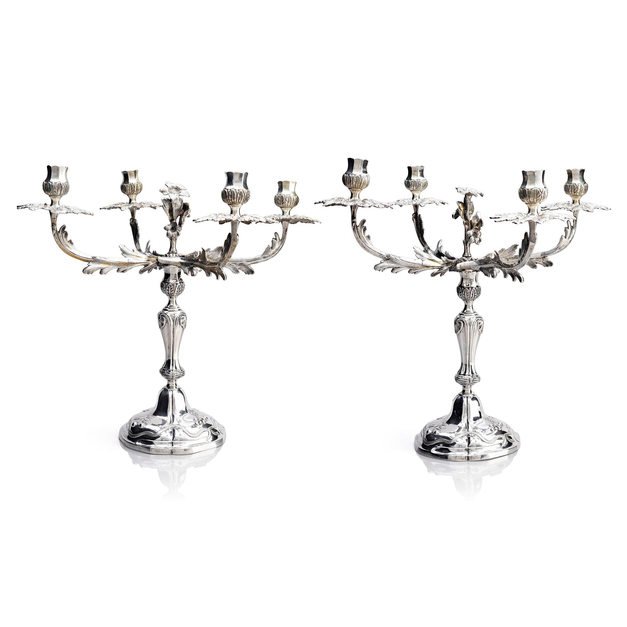 A pair of German 18th century silver candelabras, mark of C.C. Papcke, Stralsund.