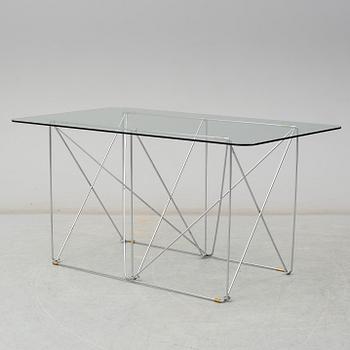 A glass dining table by IKEA.