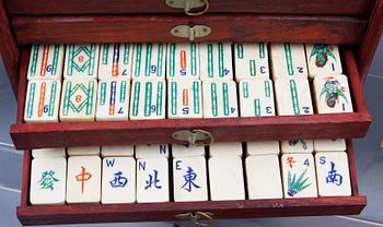 MAHJONGSPEL, trä, mässing, ben och bambu, 1900-talets första hälft.