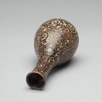 A black glazed sgrafitto vase, presumably Song dynasty (960-1279).