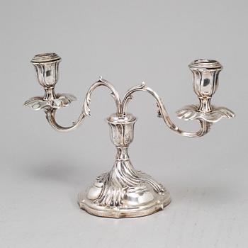 A rococo style silver candelabra, marked CG Hallberg, Stockholm 1928.