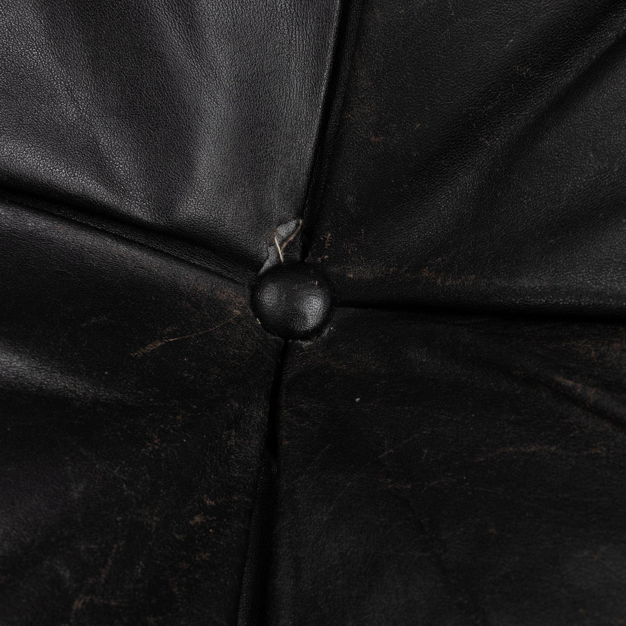 Kristian Solmer Vedel, a pair of "Modus" armchairs and a low table, Søren Willadsen, 1960's.