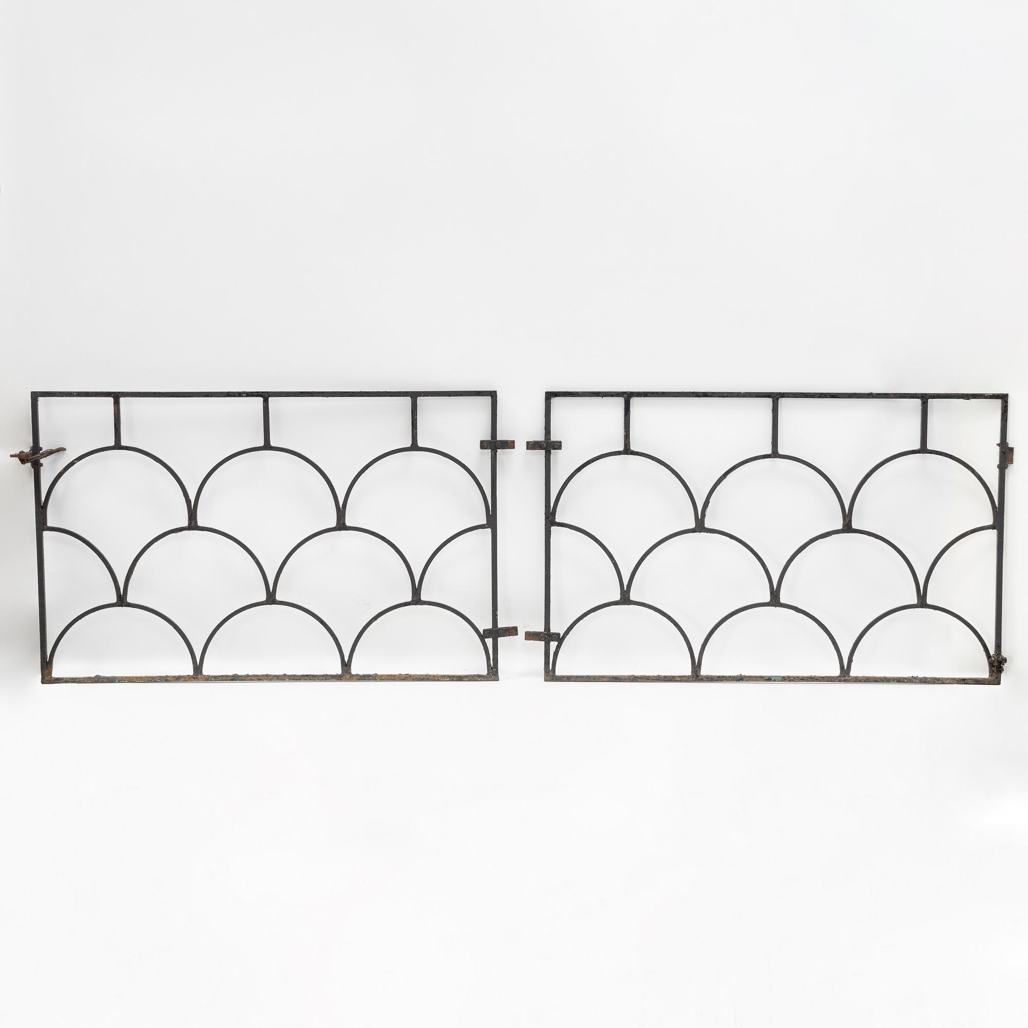 A pair of cast iron gates, 1930's.