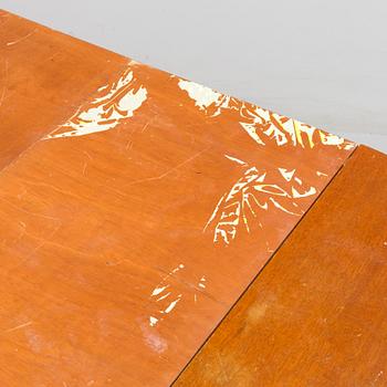 A 1940s mahogany veneer table.