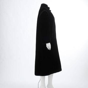 SONIA RYKIEL, a faux fur black coat.