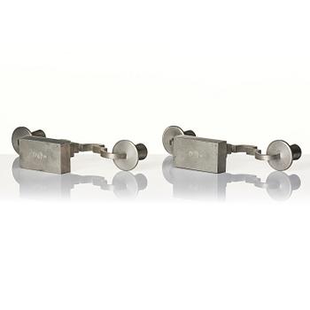Nils Fougstedt, a pair of pewter candelabra model "A 1047", Firma Svenskt Tenn, Stockholm 1932.
