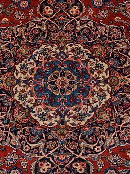 A carpet, semi-antique Kashan, ca 428,5 x 323,5 cm.